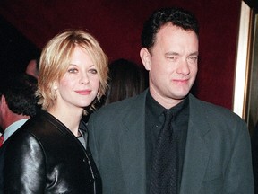 Meg Ryan and Tom Hanks pose for photographers at the premiere of 'You've Got Mail,' at the Ziegfeld Theatre 10 December in New York City. In the movie, Hanks and Ryan play enemies who meet anonymously in cyberspace and fall in love. AFP PHOTO/Matt CAMPBELL (Photo credit should read MATT CAMPBELL/AFP/Getty Images)