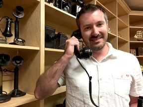 Matt Jennings, organizer of the 2017 Canadian Antique Telephone Show and Sale, with a collection of phones at Old Phone Works, where's he's the general manager. The show will be held Sept. 16 at the Amherstview Community Hall. (Mike Norris/The Whig-Standard)