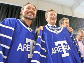 Leafs alumni Darcy Tucker (left) and Mayor John Tory show off the newly unveiled sweater in anticipation of the Toronto Maple Leafs' 100-year anniversary game on Dec. 19, at the MLSE LaunchPad in Toronto on Tuesday, Sept. 12, 2017. (DAVE ABEL/TORONTO SUN)