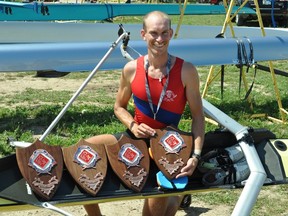 Joshua King of the Ottawa Rowing Club shows his harvest of plaques from the 2017 Royal Canadian Henley Regatta for winning four finals. (ED FOURNIER/PHOTO)