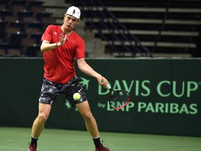 Team Canada member Denis Shapovalov returns the ball during practice in preparation for the Davis Cup Friday at Northlands Coliseum in Edmonton, September 12, 2017