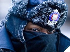 Kirk Blake, then a constable with 52 Division, mans a traffic point in the bitter cold in Toronto on Jan. 28, 2010. (Toronto Sun files)