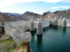 A general view of the Mike O’Callaghan-Pat Tillman Memorial Bridge part of the Hoover Dam Bypass Project is seen left of the Hoover Dam October 26, 2010 in the Lake Mead National Recreation Area, Arizona. (Ethan Miller/Getty Images)