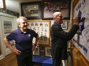 Mike Pelyk, right, in the home of Toronto Maple Leafs #1 fan Mike Wilson, who held a reunion for Toronto Marlboros 1967 Memorial Cup winning team on April 8, 2017. (Jack Boland/Toronto Sun/Postmedia Network)