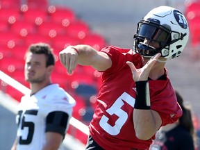 Quarterback Drew Tate, who’s filling in for the injured Trevor Harris, makes a throw at Redblacks practice yesterday. The Redblacks play the Alouettes on Sunday. (Julie Oliver/Postmedia NEtwork)
