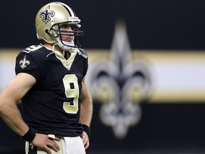 Drew Brees of the New Orleans Saints stands on the field during the game against the Houston Texans at Mercedes-Benz Superdome on Aug. 26, 2017. (Chris Graythen/Getty Images)