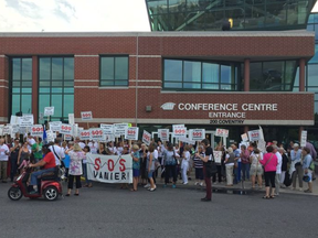 Members of the SOS Vanier group rally outside a public consultation at 200 Conventry Rd. about Salvation Army's planned move from its ByWard Market location to Montreal Road.