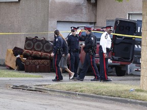 Police investigate a suspicious death near 112 Avenue and 94 Street on Wednesday, Sept. 13, 2017. Greg Southam / Postmedia