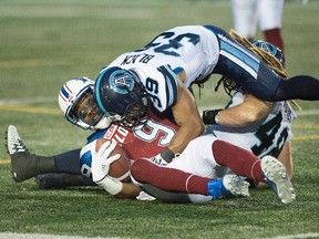 Argonauts defensive back Matt Black (top) says making sure the players are OK is one of the most important aspects of the game. (THE CANADIAN PRESS)