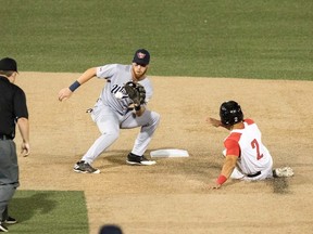 Goldeyes shortstop Andrew Sohn tries to put the tag on Wichita’s Leo Vargas at second. The Goldeyes lost 12-7. (Ed Bailey Photo)