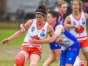 Belleville's Lara Hilmi leads Team Canada against the USA at the 2017 International Cup Australian Rules football tournament held recently in Melbourne. (Submitted photo)