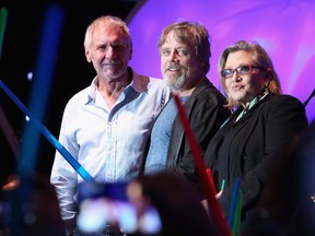 (L-R) Actors Harrison Ford, Mark Hamill, Carrie Fisher and more than 6000 fans enjoyed a surprise 'Star Wars' Fan Concert performed by the San Diego Symphony, featuring the classic 'Star Wars' music of composer John Williams, at the Embarcadero Marina Park South on July 10, 2015 in San Diego, California. (Photo by Jesse Grant/Getty Images for Disney)