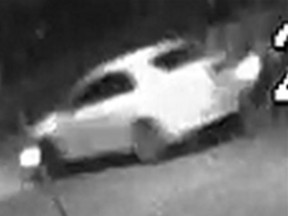 Image of white four-door sedan sought in investigation. (Toronto Police/HANDOUT)