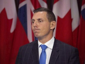 Ontario Provincial Conservative Leader Patrick Brown answers questions from the media following opening the second session of the 41st Parliament of Ontario in Toronto on Monday, Sept. 12, 2016. Premier Kathleen Wynne's lawyers wrote a letter to Patrick Brown on Wednesday asking that he withdraw comments he made about her or face a defamation lawsuit. (THE CANADIAN PRESS/Peter Power)