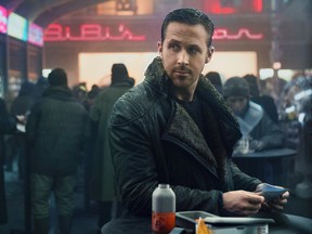 This image released by warner Bros. Pictures shows Ryan Gosling in a scene from "Blade Runner 2049." (Stephen Vaughan/Warner Bros. Pictures via AP)