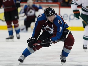 In this Thursday, April 6, 2017, file photograph, Colorado Avalanche center Matt Duchene pursues the puck in the third period of an NHL hockey game against the Minnesota Wild in Denver. Duchene, who has been the subject of trade talks for more than a year, reported for the opening day of the Avalanche's training camp on Thursday, Sept. 14, 2017, even though his future with the team remains murky at best. (AP Photo/David Zalubowski, File)