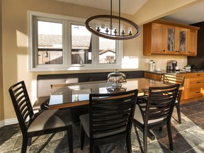 A wheelchair accessible kitchen featuring a custom banquette with a bench on one side and removable chairs on the other. The designer is Cassandra Nordell of the William Standen Co., Sarnia. (Handout/Postmedia Network)