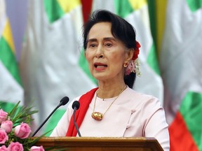 Myanmar's State Counsellor Aung San Suu Kyi delivers an opening speech during the Forum on Myanmar Democratic Transition at Myanmar International Convention Center in Naypyitaw, Myanmar, Friday, Aug 11, 2017. (AP Photo/Aung Shine Oo)