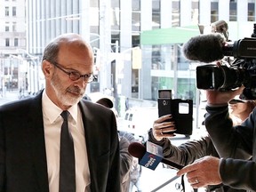 David Livingston, chief of staff to former Ontario premier Dalton McGuinty, arrives at court in Toronto on Monday, Sept. 11, 2017. Livingston and his deputy Laura Miller face allegations they illegally destroyed documents related to a government decision to scrap two gas plants ahead of 2011 provincial election. (THE CANADIAN PRESS/PHOTO)