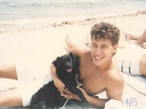 Columnist Bill Welychka at Alcona Beach on Lake Simcoe, south of Barrie, with his brother’s dog Fernie in 1985. (Submitted photo)