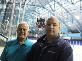 City of Sarnia fundraising liaison Greg Burr, left, and Trevor Sanderson, manager of arenas, stand by the ice in the Sarnia Arena. Upgrades to the building are expected to start in earnest this fall.  Tyler Kula/Sarnia Observer/Postmedia Network