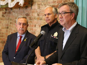 Mayor Jim Watson with Chief Charles Bordeleau and police services board chair Eli El-Chantiry at a press conference in June 2017. JEAN LEVAC / POSTMEDIA NEWS