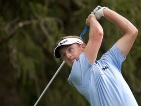 Jared du Toit of Kimberely, BC tees off the 18th hole at Highland Country Club during the first round of the Freedom 55 Financial Championship in London on Thursday. He finished the day 9 under. (DEREK RUTTAN, The London Free Press)