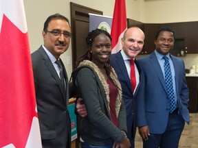 From left, Amarjeet Sohi, federal minister of infrastructure and communities; Alice Achola; Randy Boissonnault, Liberal MP for Edmonton Centre; and John Gaye, chair of the Africa Centre. Shaughn Butts / Postmedia