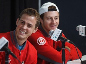 Canada's Vasek Pospisil, left, and Brayden Schnur speak during a Davis Cup press conference in Edmonton, Alta., on Tuesday, September 12, 2017.