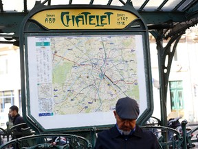 View of one of the entrances of the Chatelet metro station in central Paris, France. Paris police say a knife-wielding assailant tried to attack a soldier in Chatelet station but was quickly arrested and no one was hurt. (AP Photo/Thibault Camus)