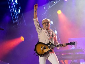 Found of the band Foreigner, Mick Jones, plays at Ottawa Bluesfest in 2014. (Wayne Cuddington/Postmedia Network/Files)