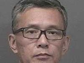 Ren "Johnathon" Zhang, 52, of Richmond Hill faces a criminal harassment charge after allegedly asking for a 14-year-old student's phone number and then showing up later at her home. (York Regional Police/Handout)