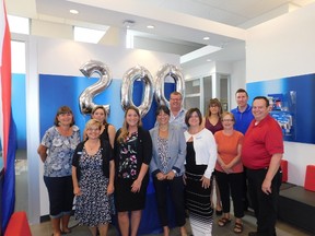 (Front row, L to R): Sheila Brooks (Branch Manager); Natasha Maize (CSR); Debbie Czaniecki (Regional Vice President); Laury Balina (Assistant Branch Manager); Linda Krietzer (CSR); Mayor Kevin Morrison.
(Back row, L to R): Mary Rivett (retiree); Jen Broome (Financial Service Manager); Justin Pearson (Business Banker); Melissa Brodhagen (CSR); Nathan Arand (Financial Planner).