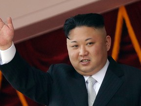 In this April 15, 2017, file photo, North Korean leader Kim Jong Un waves during a military parade in Pyongyang, North Korea. South Korea's military said Friday, Sept. 15, 2017 North Korea fired an unidentified missile from its capital Pyongyang that flew over Japan before landing in the northern Pacific Ocean. (AP Photo/Wong Maye-E, File)