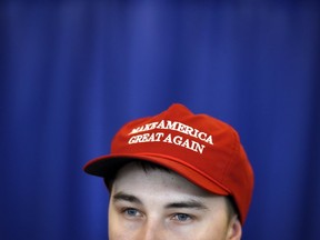 Matt Atkins wears a Make America Great Again hat as he attends the Manning Centre conference in Ottawa on Friday, Feb. 24, 2017. (Justin Tang/The Canadian Press)