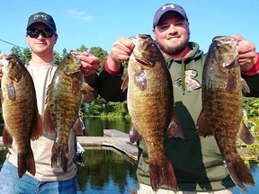 Classic champs hoist up an impressive fish limit of 18.6 pounds, secured by a kicker smallie weighing six pounds for a big fish award on Day 1 of Nickel City Bass Classic, Sept. 9-10. Photo supplied