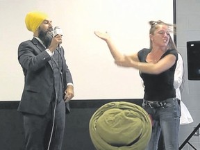 At a meet-the-candidate event, a woman accuses NDP leadership candidate Jagmeet Singh of wanting to bring Shariah law to Canada.