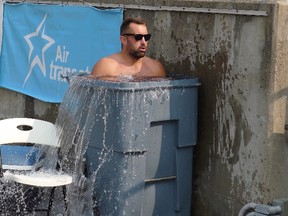 Toronto Wolfpack hooker Bob Beswick sits in an ice bath at practice yesterday ahead of the club’s final game of the season. The Canadian Press