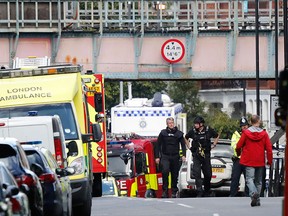 Ambulances and police nearby after an incident on a subway train at Parsons Green subway station in London, Friday, Sept. 15, 2017. (AP Photo/Frank Augstein)