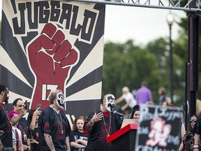 Joseph Utsler, known as Shaggy 2 Dope from the hip hop duo Insane Clown Posse, speaks beside Joseph Bruce, known as Violent J, left, at the Juggalo March, at the Lincoln Memorial on the National Mall, Sept. 16, 2017 in Washington, D.C.  (Al Drago/Getty Images)