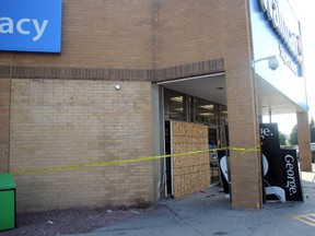 Repairs are done to a Walmart entrance after a collision on Saturday afternoon.