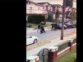 A video posted on Facebook shows an aggressive police takedown in Burnaby, B.C. (Facebook)