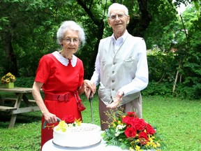 Jean Spear wore a red dress like the one she had on when she first met her future husband, George Spear, with whom she celebrated her 72nd wedding anniversary on Aug. 22, 2014.