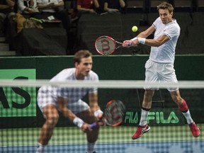 Daniel Nester, right, and Vasek Pospisil of Canada defeated India three sets to one in Davis Cup tennis at the Coliseum in Edmonton on September 16, 2017.