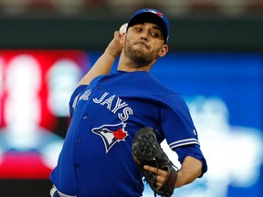 Toronto Blue Jays pitcher Marco Estrada throws against the Minnesota Twins in the first inning of a baseball game Saturday, Sept. 16, 2017, in Minneapolis. (AP Photo/Jim Mone)
