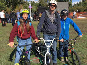 Emily Henderson, 14, Scott Henderson, and Creston Henderson, 13, at the FISE World Series competition in Edmonton.