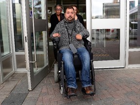 Witness Andrew Olivier leaves following the first day in an Election Act bribery trial in Sudbury, Ontario, Thursday, Sept. 7, 2017. Pat Sorbara, who was at the time the Ontario Liberal Party CEO, faces two charges and Lougheed, a local Liberal fundraiser, faces one charge. THE CANADIAN PRESS/Sean Kilpatrick
