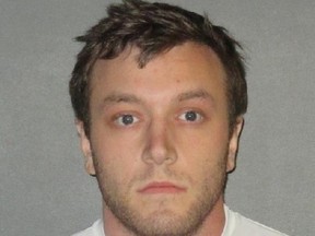 Kenneth Gleason is shown in an undated booking photo provided by the East Baton Rouge Sheriff’s Office. Police believe the slayings of two black men in Baton Rouge were likely racially motivated and said Sunday, Sept. 17, 2017, that they have a person of interest — Gleason — in custody. (East Baton Rouge Sheriff’s Office via AP)