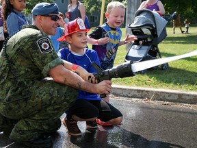 Tim Miller/The Intelligencer
Nine-year-old Jacob Kiah shoots a stream of water at a nearby target during the Trenton Military Family Resource Centre (MFRC) Family Day event on Sunday in Quinte West.