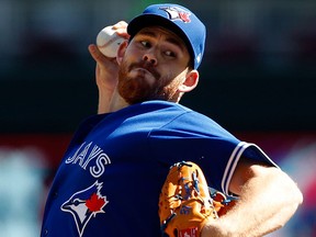 Toronto Blue Jays pitcher Joe Biagini throws against the Minnesota Twins in the first inning of a baseball game Sunday, Sept. 17, 2017, in Minneapolis. (AP Photo/Jim Mone)